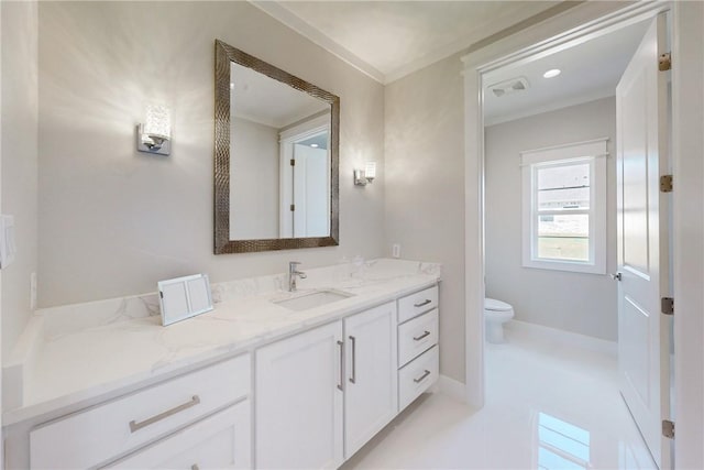 7844 Mathis Creek Dr, Bryan, TX 77808 - bathroom featuring crown molding, vanity, toilet, and visible vents