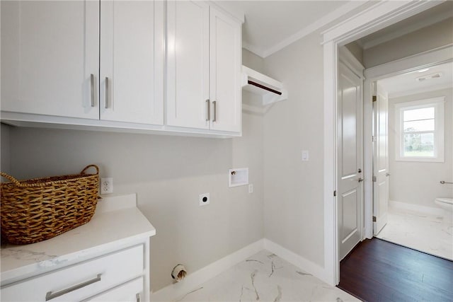 7844 Mathis Creek Dr, Bryan, TX 77808 - washroom with cabinet space, washer hookup, marble finish floor, baseboards, and electric dryer hookup