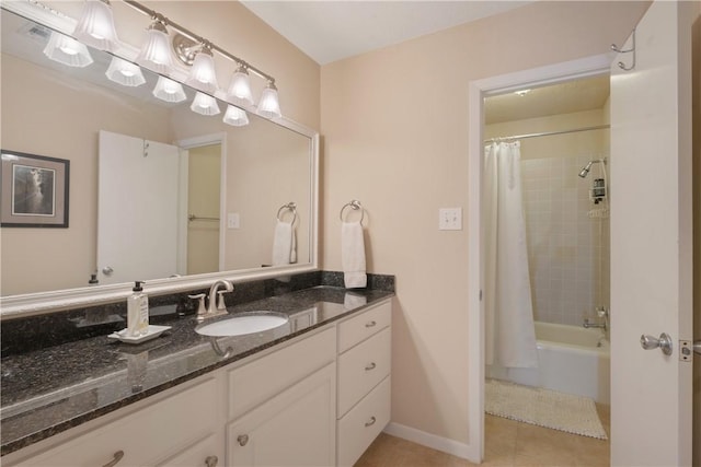 bathroom featuring vanity, shower / bathtub combination with curtain, and tile patterned floors