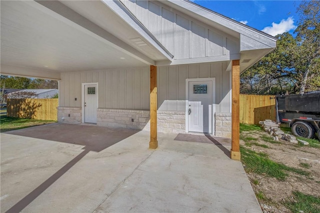 exterior space with a carport