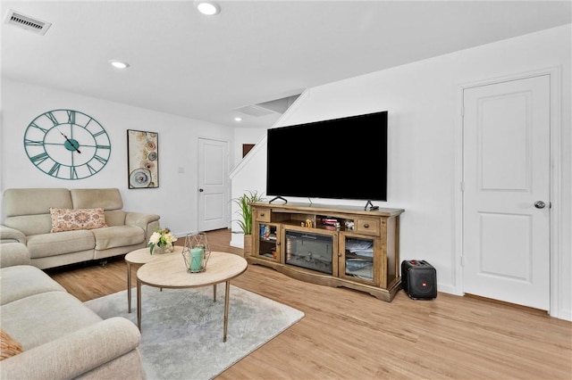 317 Riverwood Village Ln, Sealy, TX 77474 - living room with recessed lighting, wood finished floors, and baseboards