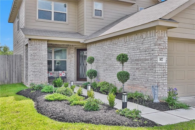 317 Riverwood Village Ln, Sealy, TX 77474 - property entrance with an attached garage
