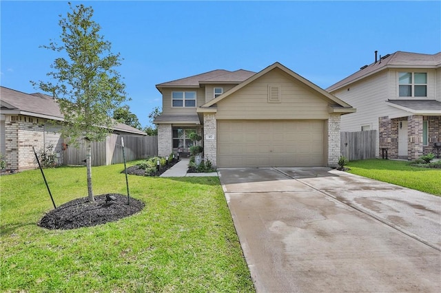 317 Riverwood Village Ln, Sealy, TX 77474 - view of front of property featuring concrete driveway, a garage, and brick siding