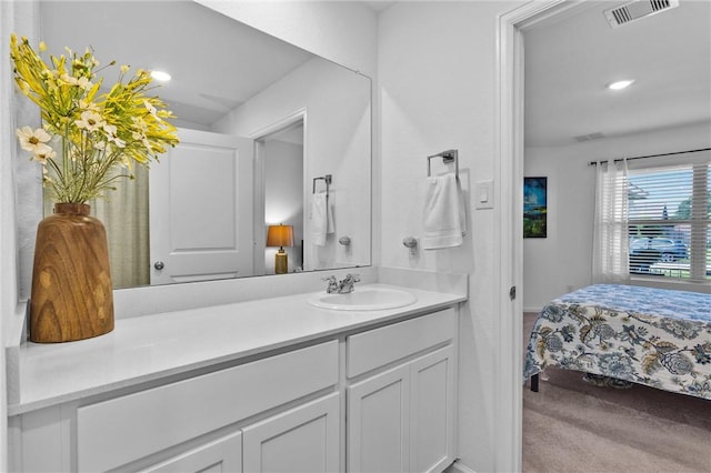 317 Riverwood Village Ln, Sealy, TX 77474 - bathroom featuring ensuite bath, vanity, and recessed lighting