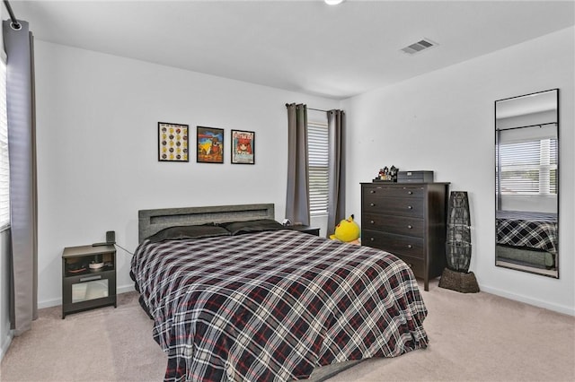 317 Riverwood Village Ln, Sealy, TX 77474 - carpeted bedroom featuring baseboards