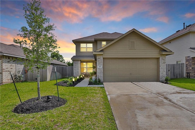 317 Riverwood Village Ln, Sealy, TX 77474 - traditional-style house featuring concrete driveway, brick siding, and a garage