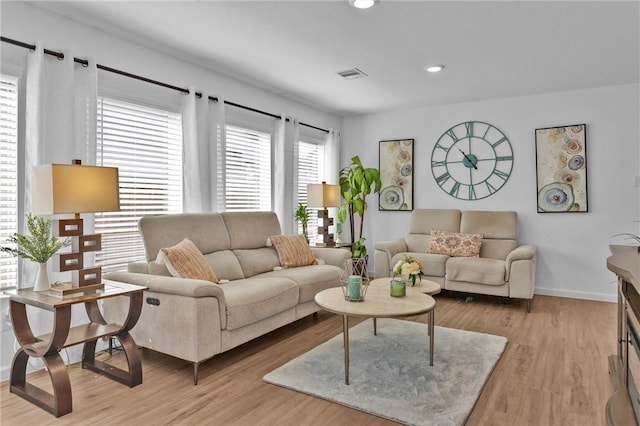 317 Riverwood Village Ln, Sealy, TX 77474 - living room with light wood finished floors, baseboards, and recessed lighting