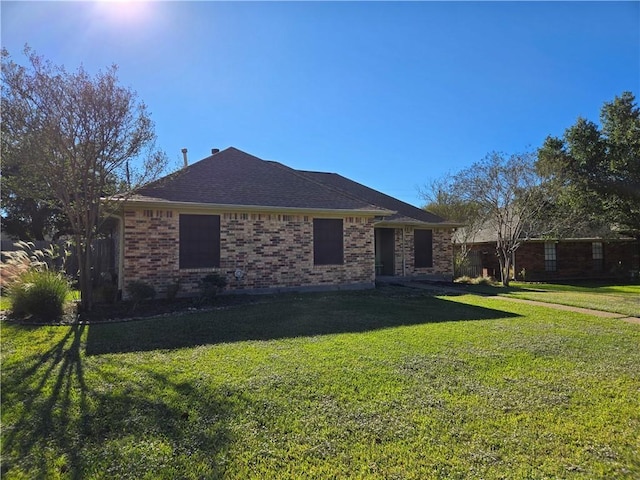 exterior space with a front lawn