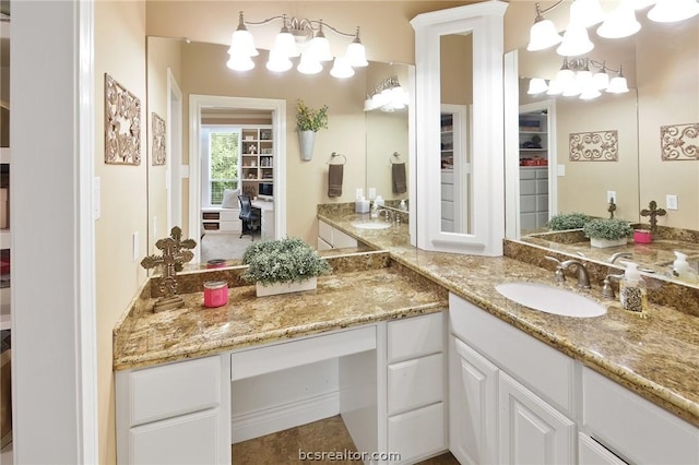 bathroom featuring tile patterned floors and vanity