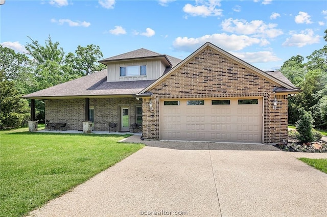 front of property with a garage and a front yard