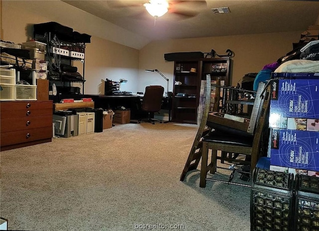 office area featuring vaulted ceiling and ceiling fan