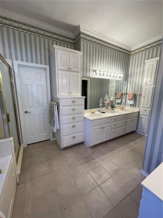 bathroom with tile patterned floors, vanity, crown molding, and separate shower and tub