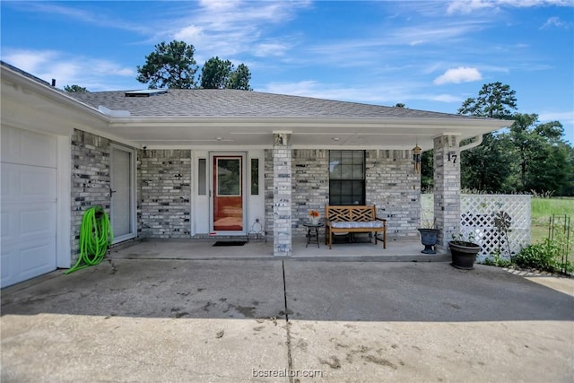 property entrance with a garage