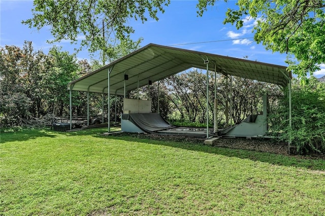 view of yard with a carport