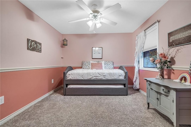 bedroom with ceiling fan and light carpet