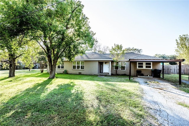 ranch-style home with a front lawn and a carport