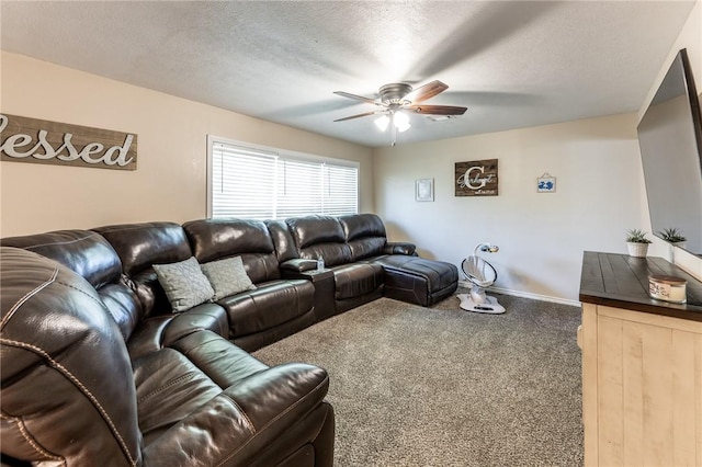 carpeted living room with a textured ceiling and ceiling fan