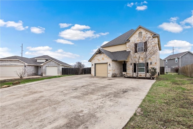 view of front facade featuring a front lawn and a garage