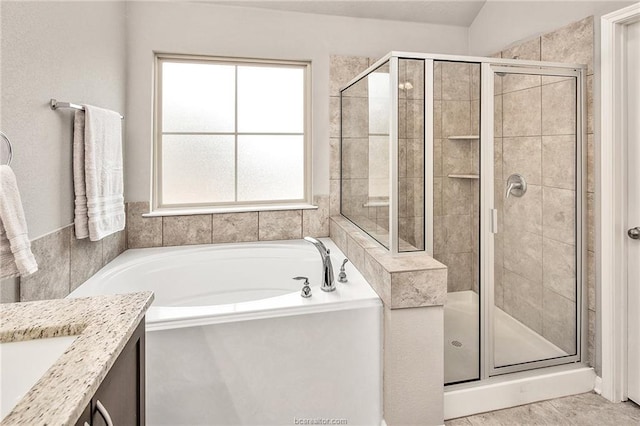 bathroom with vanity, separate shower and tub, plenty of natural light, and vaulted ceiling