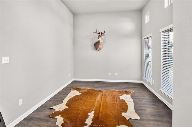 2025 Jester Trl, Bryan, TX 77807 - unfurnished room with baseboards and wood finished floors