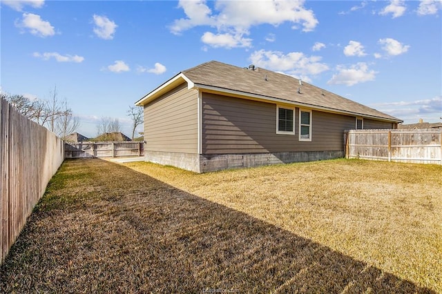 2025 Jester Trl, Bryan, TX 77807 - back of house featuring a fenced backyard