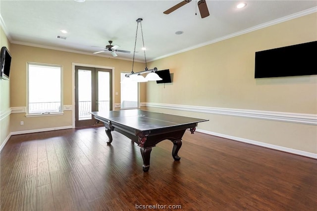 playroom with french doors, dark hardwood / wood-style flooring, ceiling fan, and crown molding