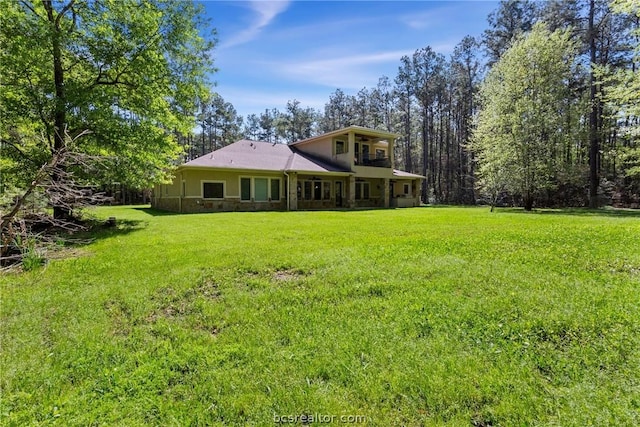 exterior space with a lawn