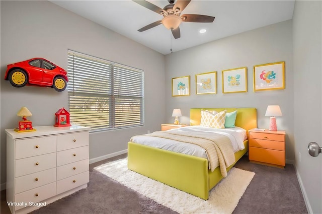 carpeted bedroom featuring ceiling fan