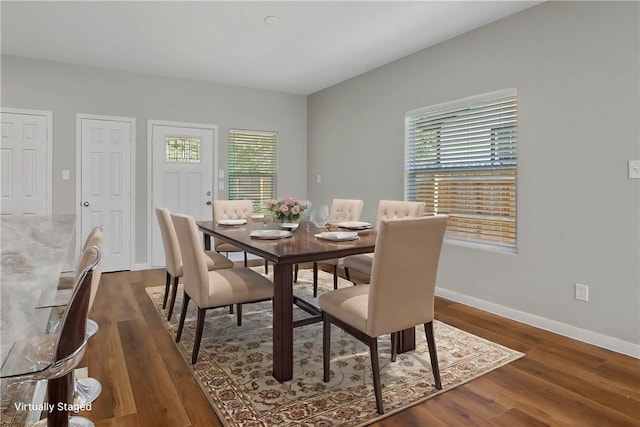 dining room featuring dark hardwood / wood-style floors