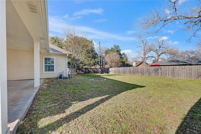 view of yard featuring fence