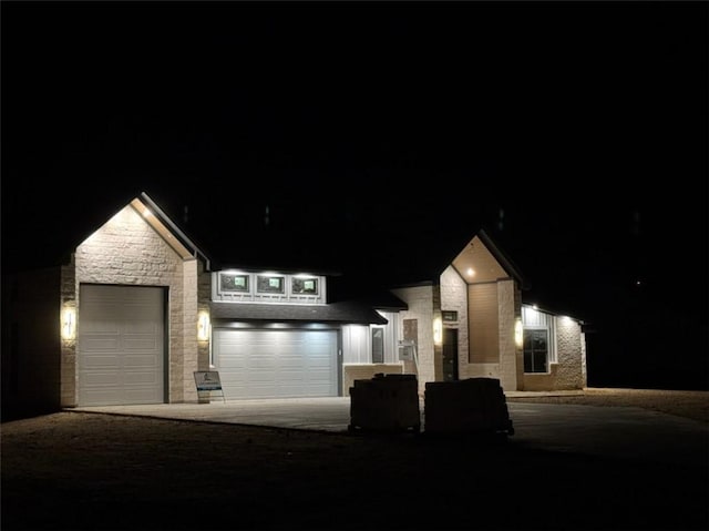 view of front of home with a garage