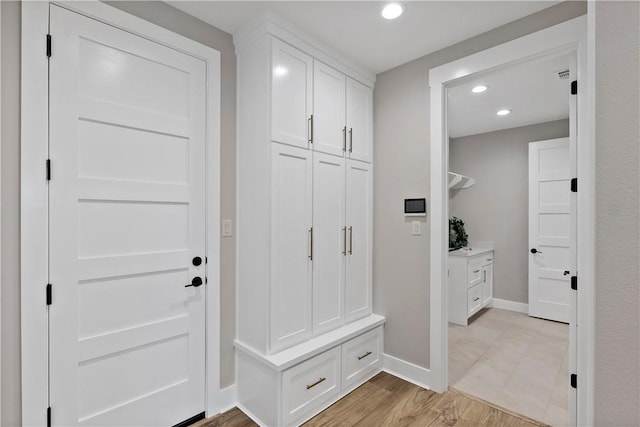 mudroom featuring light hardwood / wood-style floors