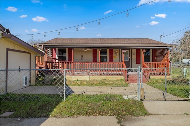 ranch-style home with a front yard and a porch