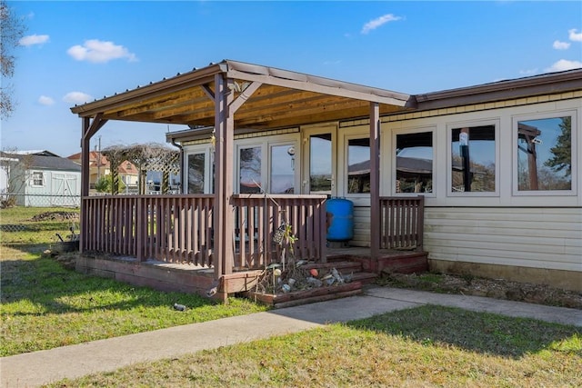 wooden deck with a yard