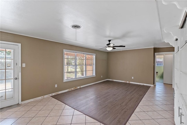 interior space featuring ceiling fan and light tile patterned flooring