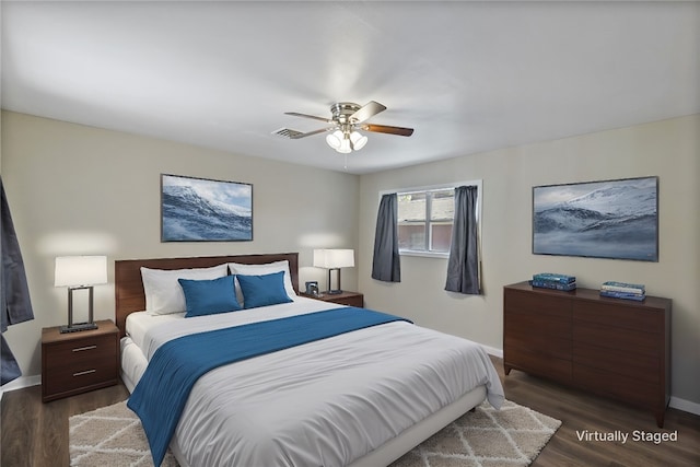 bedroom featuring dark hardwood / wood-style floors and ceiling fan