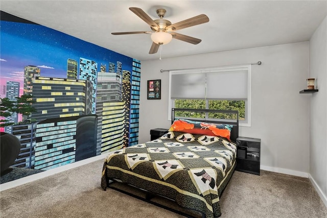 bedroom featuring ceiling fan and carpet floors