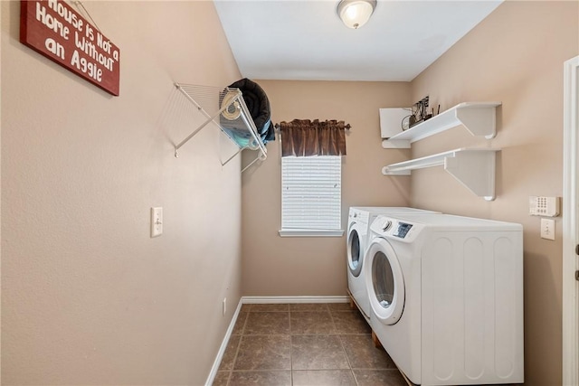 washroom with washer and dryer