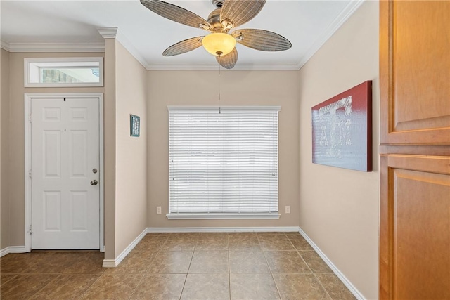 entrance foyer with ceiling fan and ornamental molding