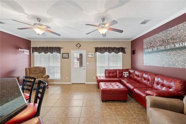 living room featuring tile patterned floors, ceiling fan, and crown molding