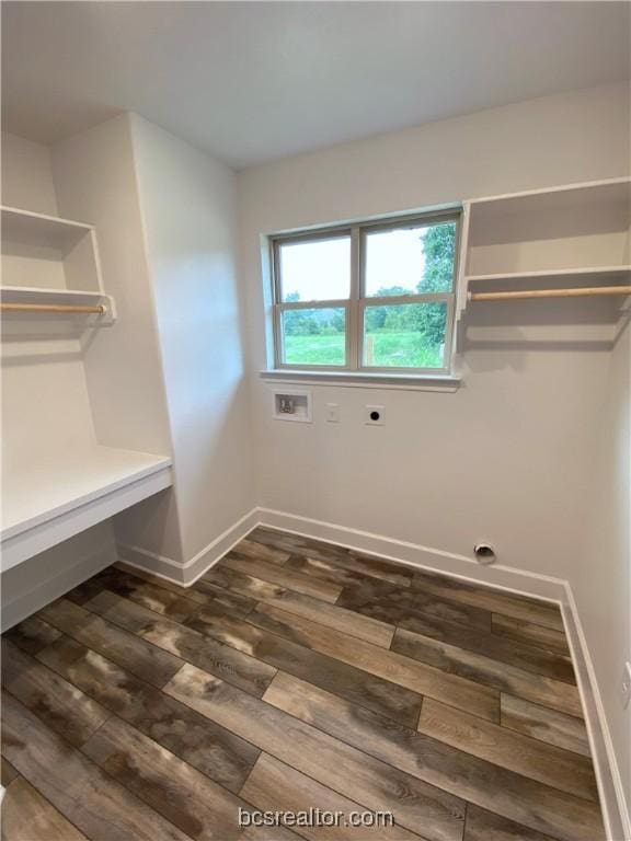 laundry area with electric dryer hookup, dark hardwood / wood-style flooring, and hookup for a washing machine