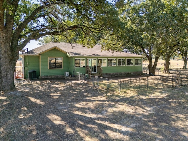 ranch-style house with central AC