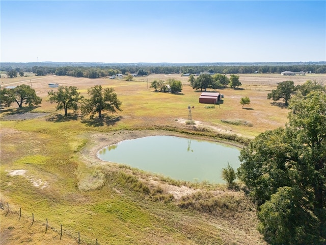 birds eye view of property with a rural view and a water view