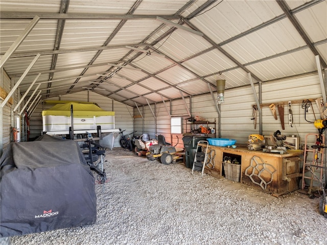 garage featuring wood walls