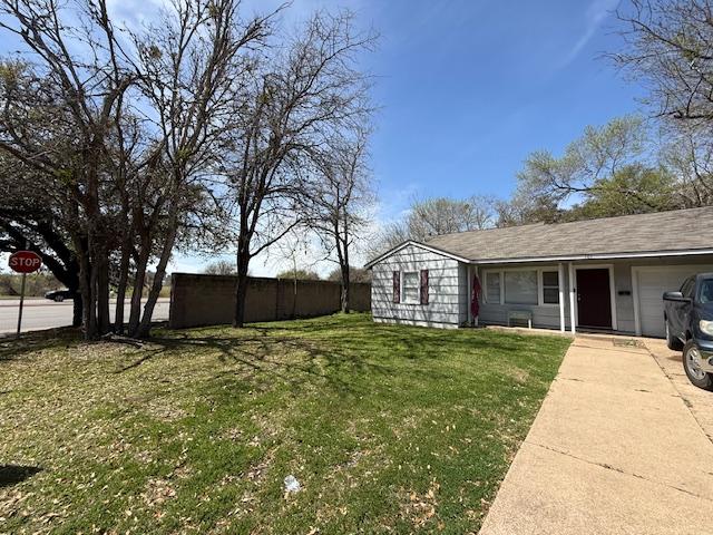 view of yard with an attached garage