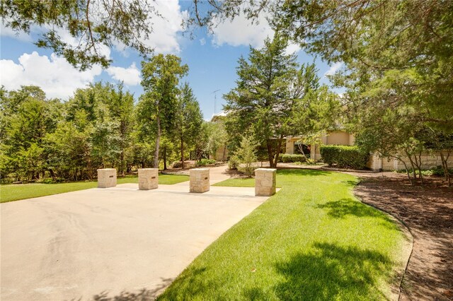 18140 Osage Trail Dr, College Station, TX 77845 - view of community with a yard and a patio
