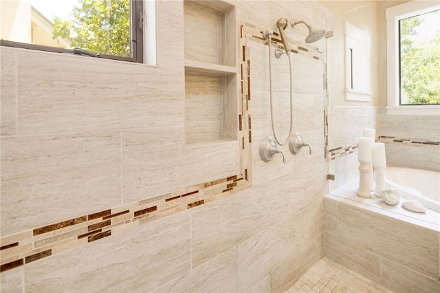 18140 Osage Trail Dr, College Station, TX 77845 - bathroom with a tile shower and a bath