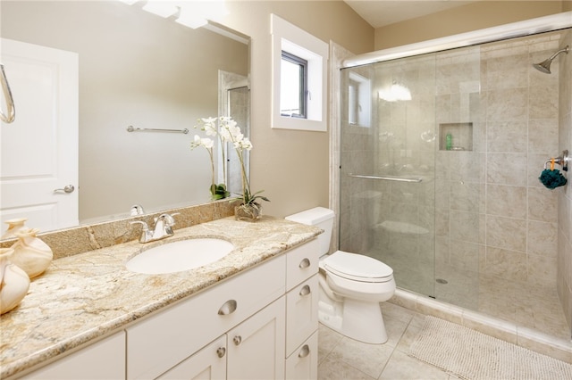 18140 Osage Trail Dr, College Station, TX 77845 - bathroom with a stall shower, toilet, tile patterned flooring, and vanity