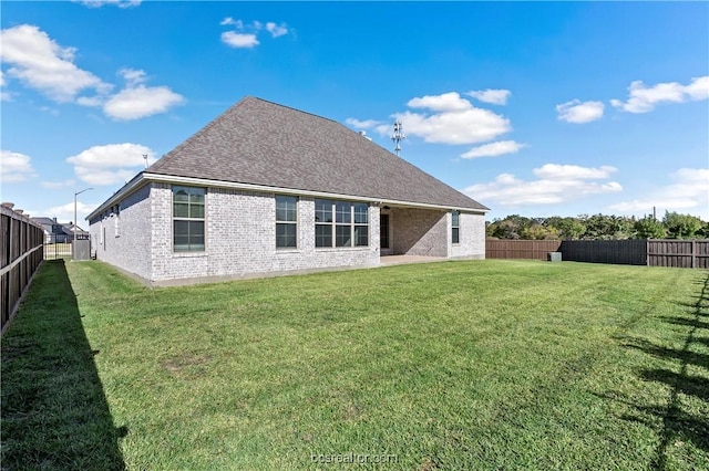 2160 Madden Cir, College Station, TX 77845 - rear view of house with brick siding and a shingled roof