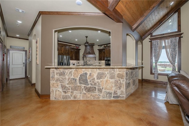 interior space featuring visible vents, concrete flooring, beamed ceiling, recessed lighting, and arched walkways